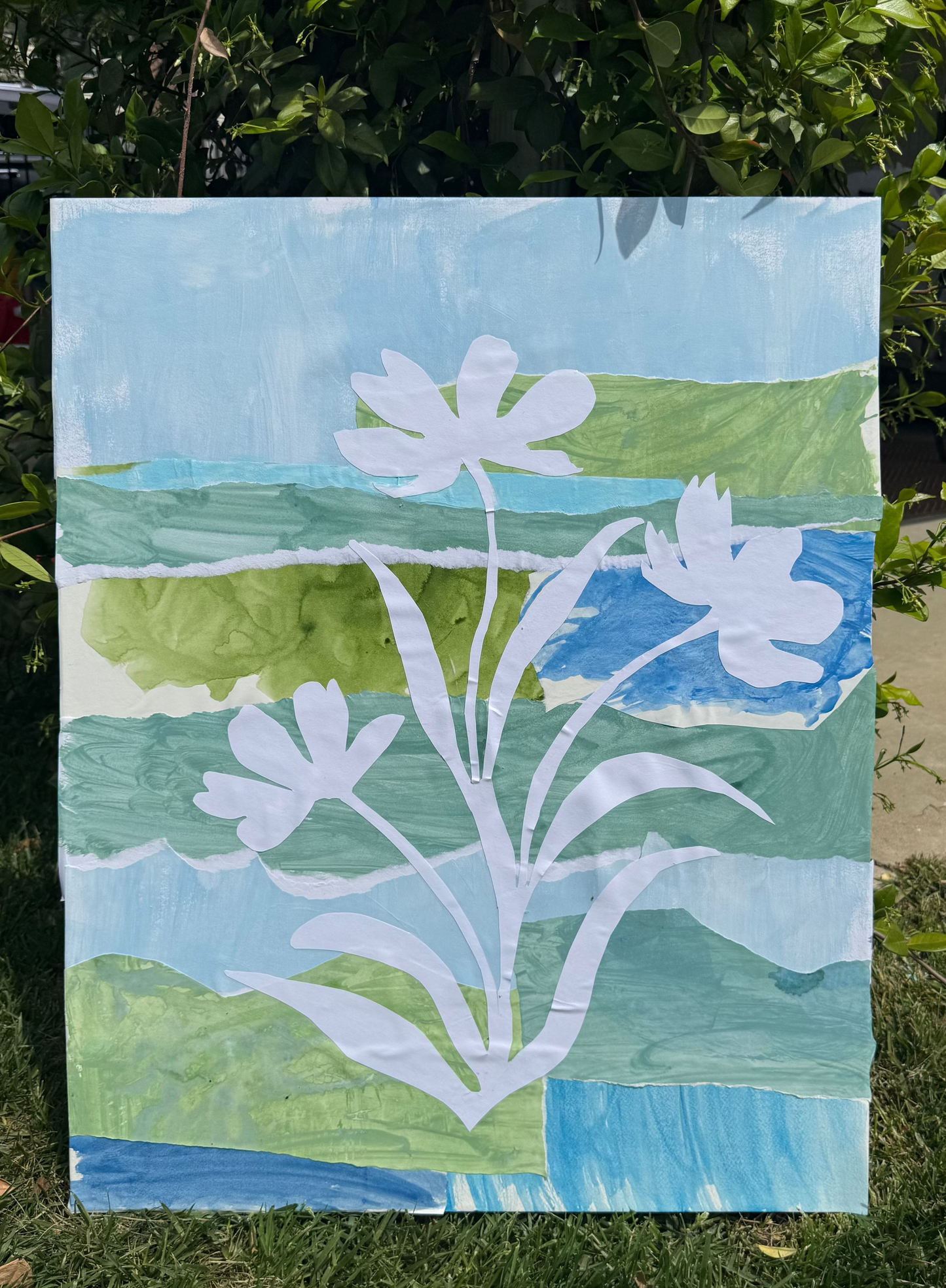 Artistic depiction of flowers on a textured surface with a natural background